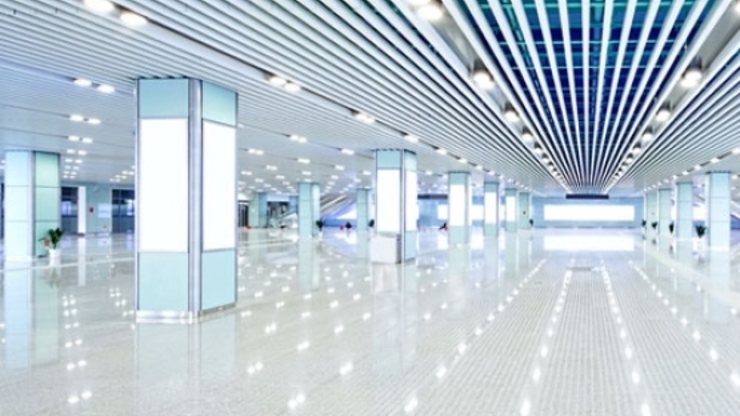 Commercial concourse with linear ceiling lighting